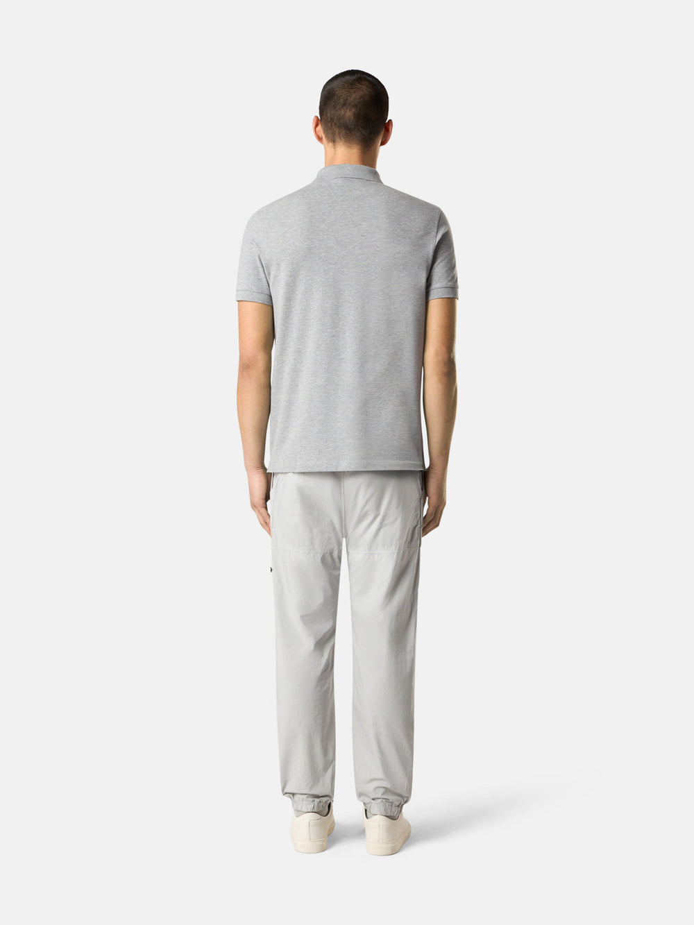 2200005 95% ORGANIC COTTON / 5% ELASTANE PIQUÉ Slim-fit short-sleeve polo shirt with Compass patch